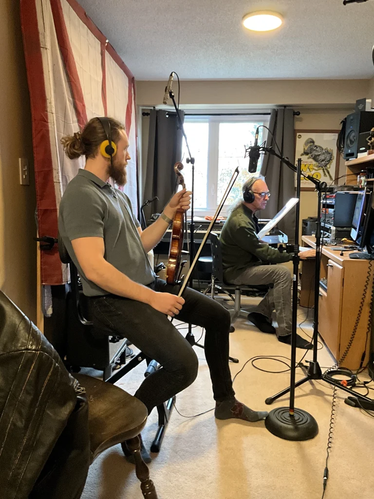 Kristof Sokulski and Kit Johnson in Kit’s home, studio where I recorded the song